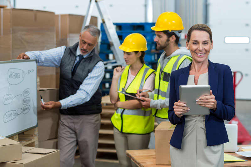 Warehouse team having a meeting in warehouse